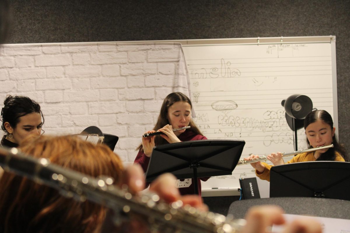 (Left to Right) Ayla Marvasti, Elsa Krol, and Sonoka Takahashi playing “Married Life” from “Up” at Flute Choir. 