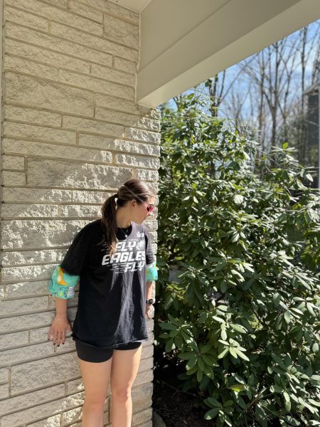 State High senior, Patty Hennessey, hides from her assassin while wearing goggles and floaties to prevent herself from getting eliminated. 
