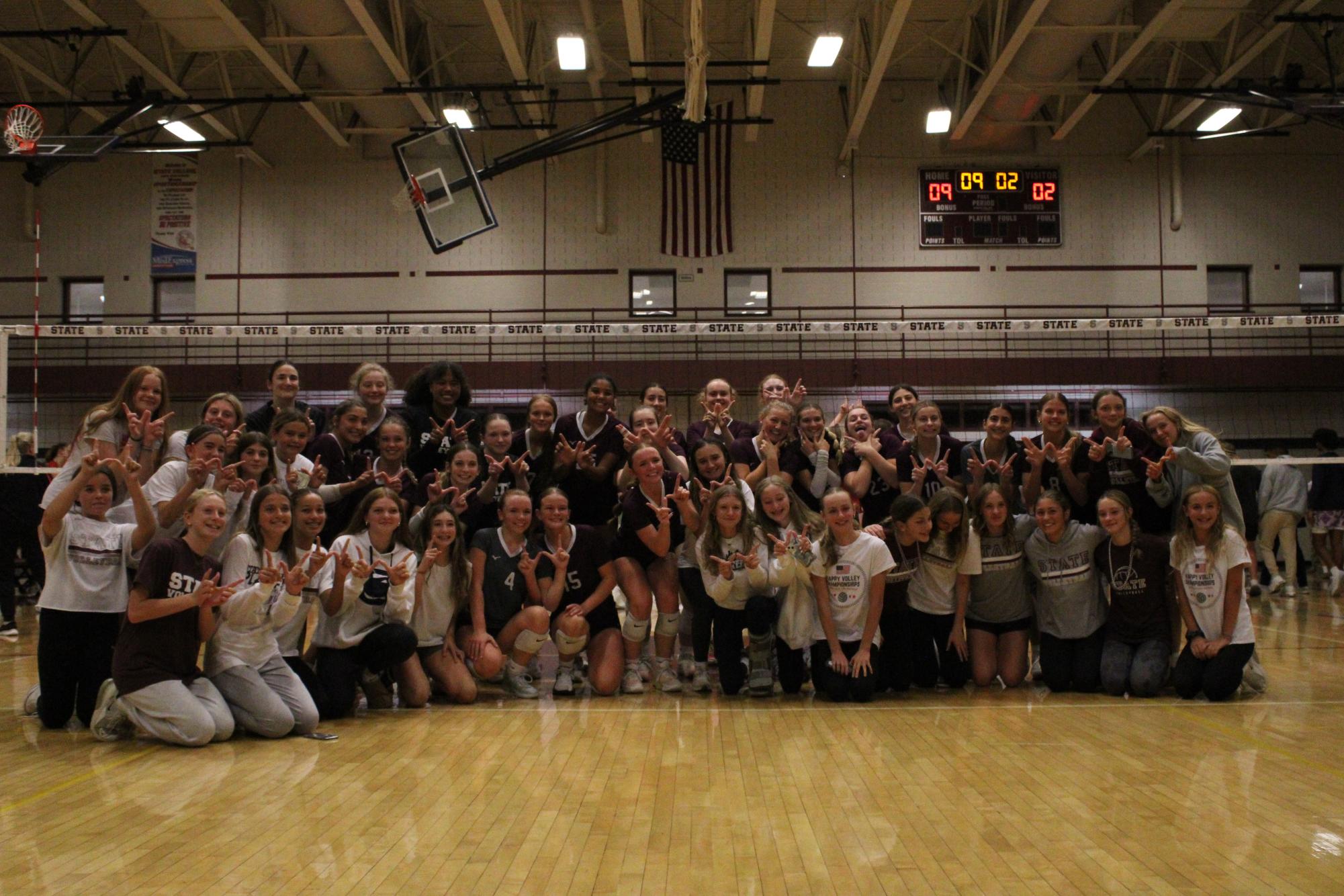 The varsity, junior varsity and middle school teams posing after the game against Cumberland Valley on Sept. 25.