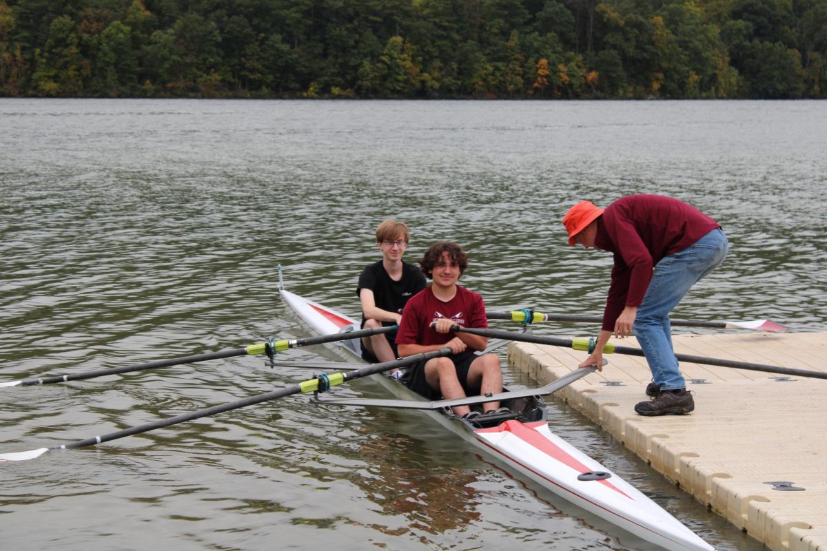 Gerald Bugden and Chase Bayly prepare to push off from the boat launch in preparation for the regatta - September 28, 2024