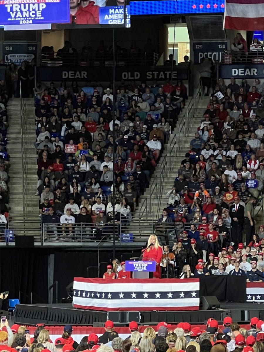 Congresswoman Marjorie Taylor Greene (R-GA) leads off Trump's rally at the Bryce Jordan Center on Oct. 26. 