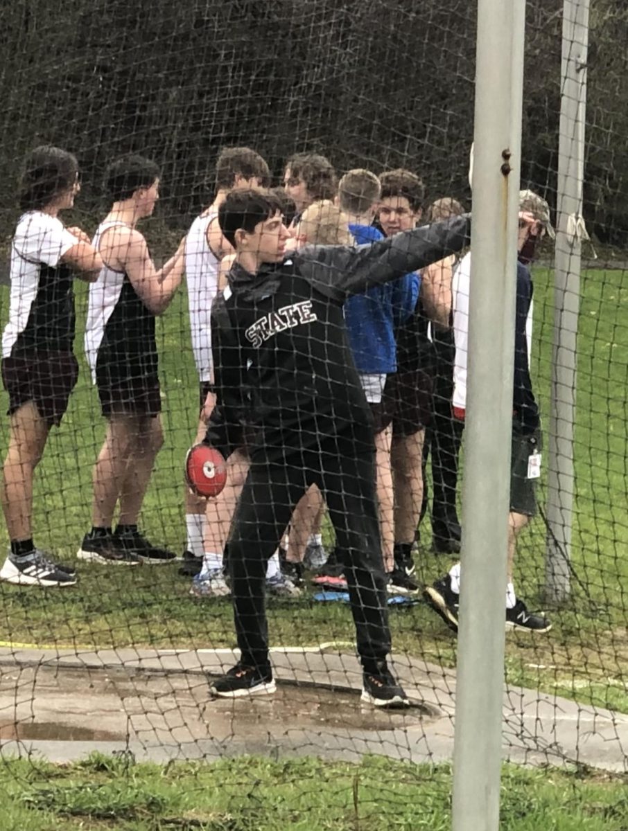 Junior Tanner Cohagan participates in a track and field practice.