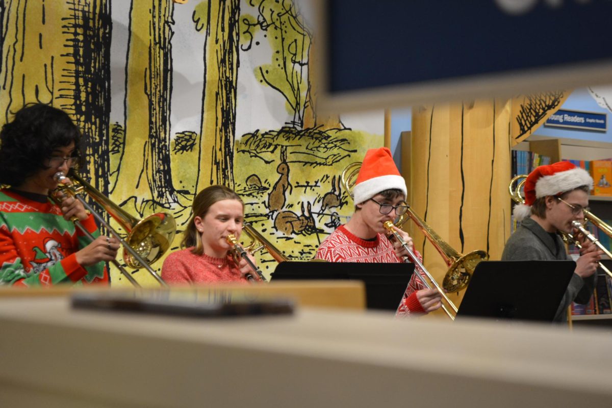 Members of the trombone choir perform at Barnes and Noble on Dec. 6. 