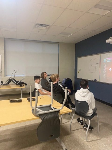 Games Club members gathering to play video games together.