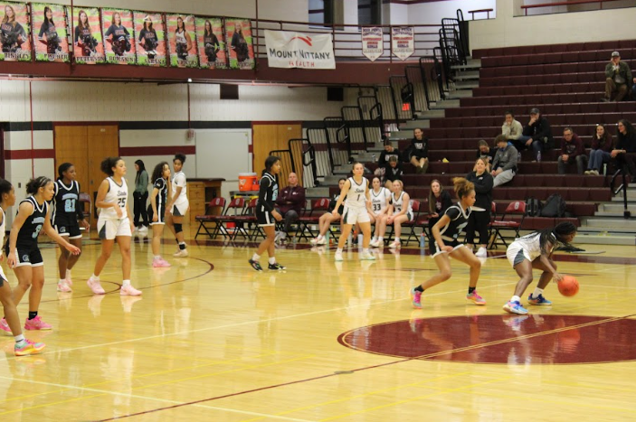 Junior McKenna Whitehurst defends her possession over the ball. 