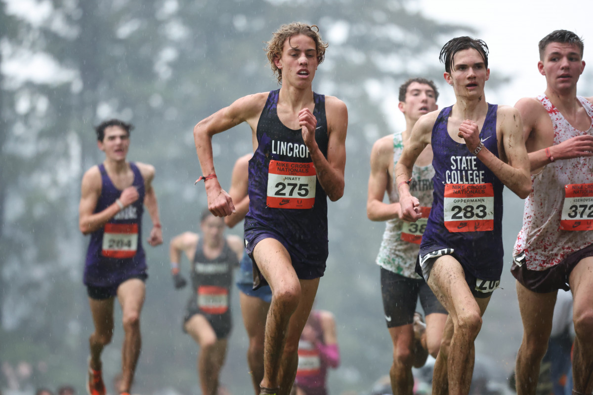 Theo Oppermann battling for his spot in the Nike Cross Country Nationals race. Photo courtesy of RunnerSpace.com.