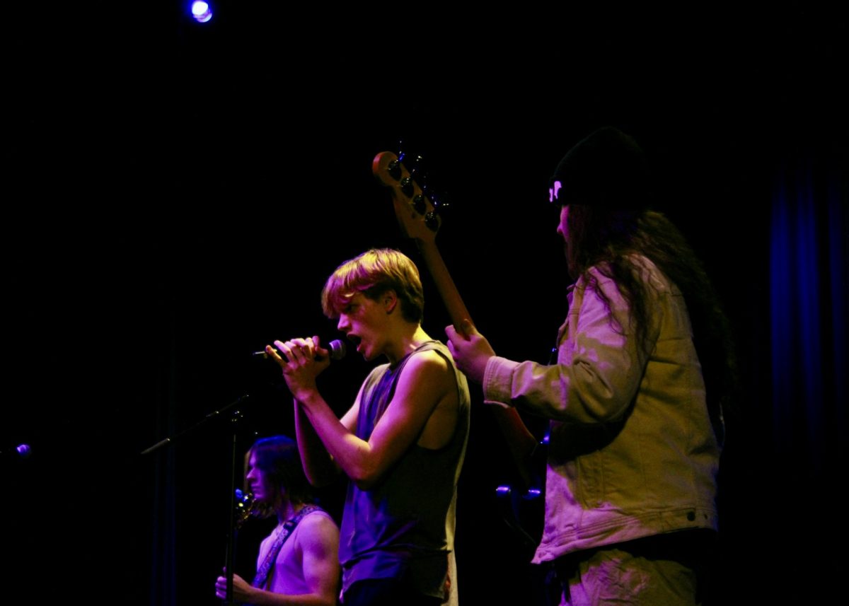 Sophomores Teddy Schaeffer and Aaron Turner and junior James Lukehart perform at the Advanced Rock Ensemble Concert. 