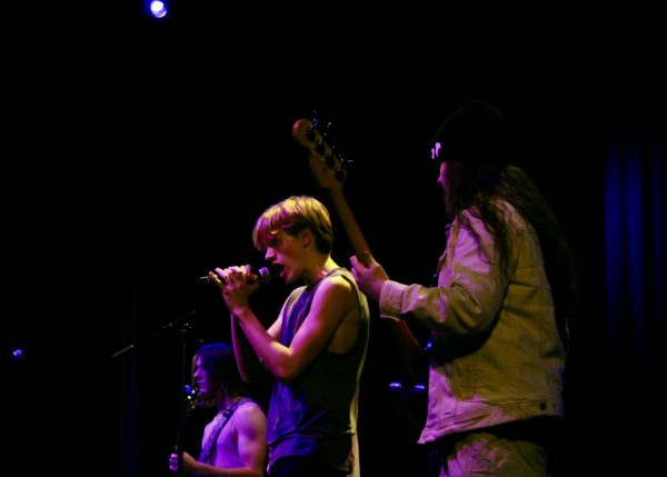 Sophomores Teddy Schaeffer and Aaron Turner and junior James Lukehart perform at the Advanced Rock Ensemble Concert. 