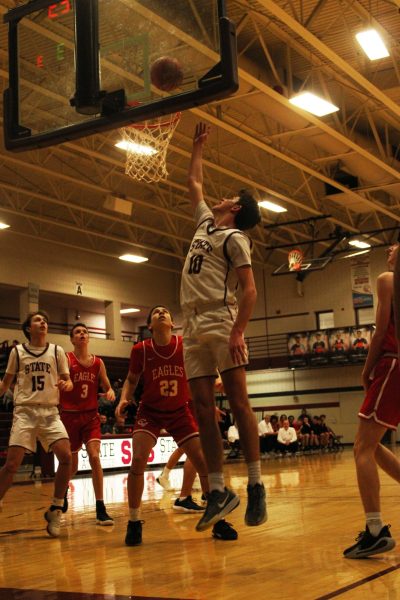 Senior Reed Melvin shooting a layup against Cumberland Valley.