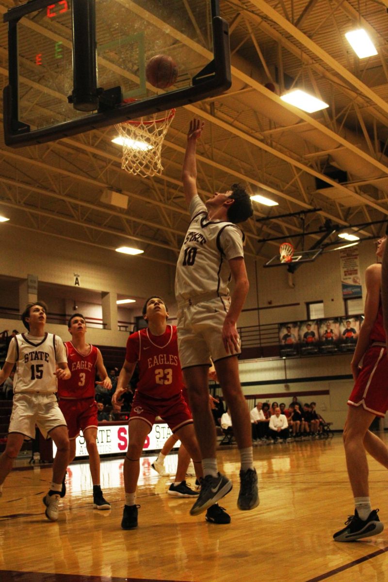 Senior Reed Melvin shooting a layup against Cumberland Valley.