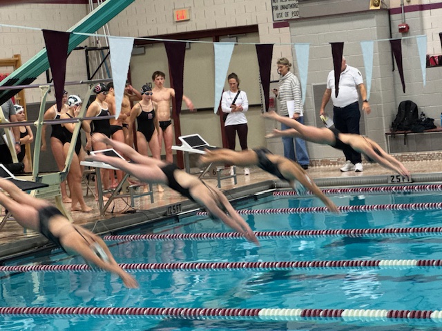 The State College Little Lions and Central Dauphin Rams dive into the water as soon as the referee blew the whistle.