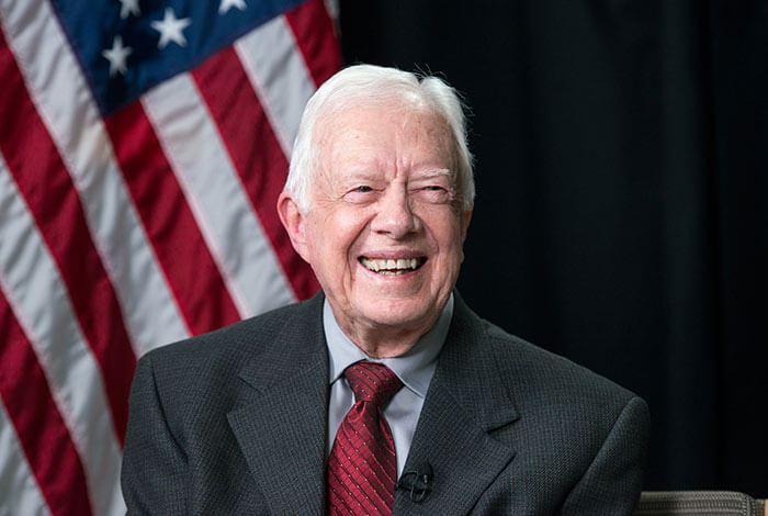 Former U.S. President Jimmy Carter smiles in Austin, Texas for a 2014 portrait. (Courtesy of the LBJ Library)