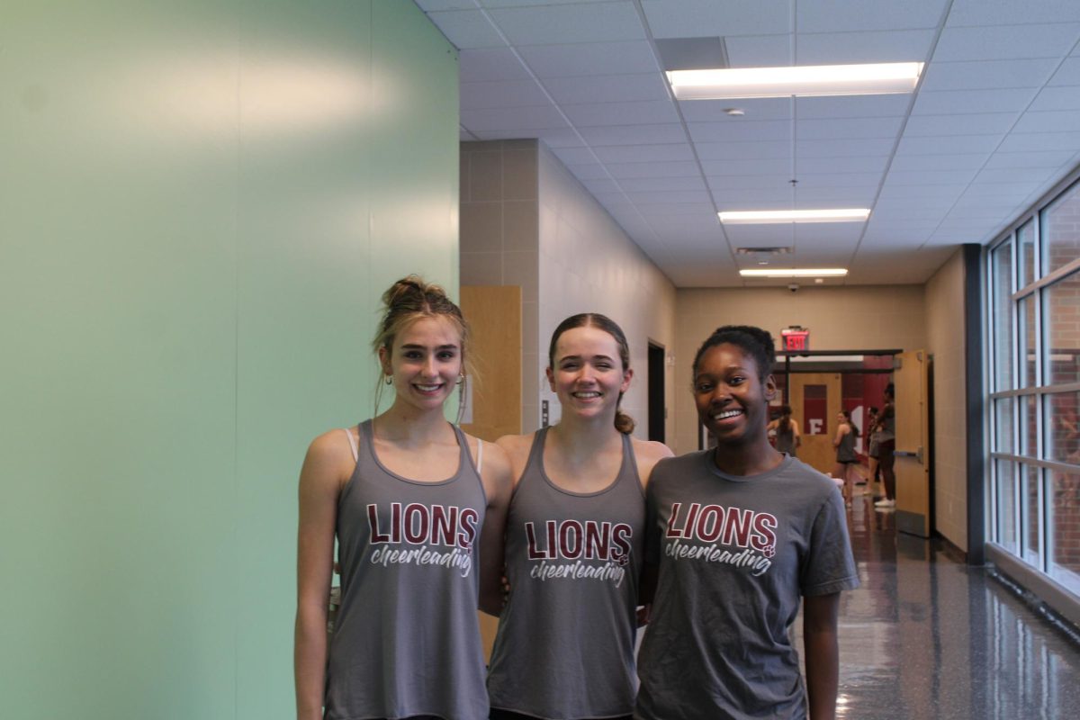 Freshmen Nova Loht, Jaycee Claus, and Amaris King take a break from their practice on Feb.13.