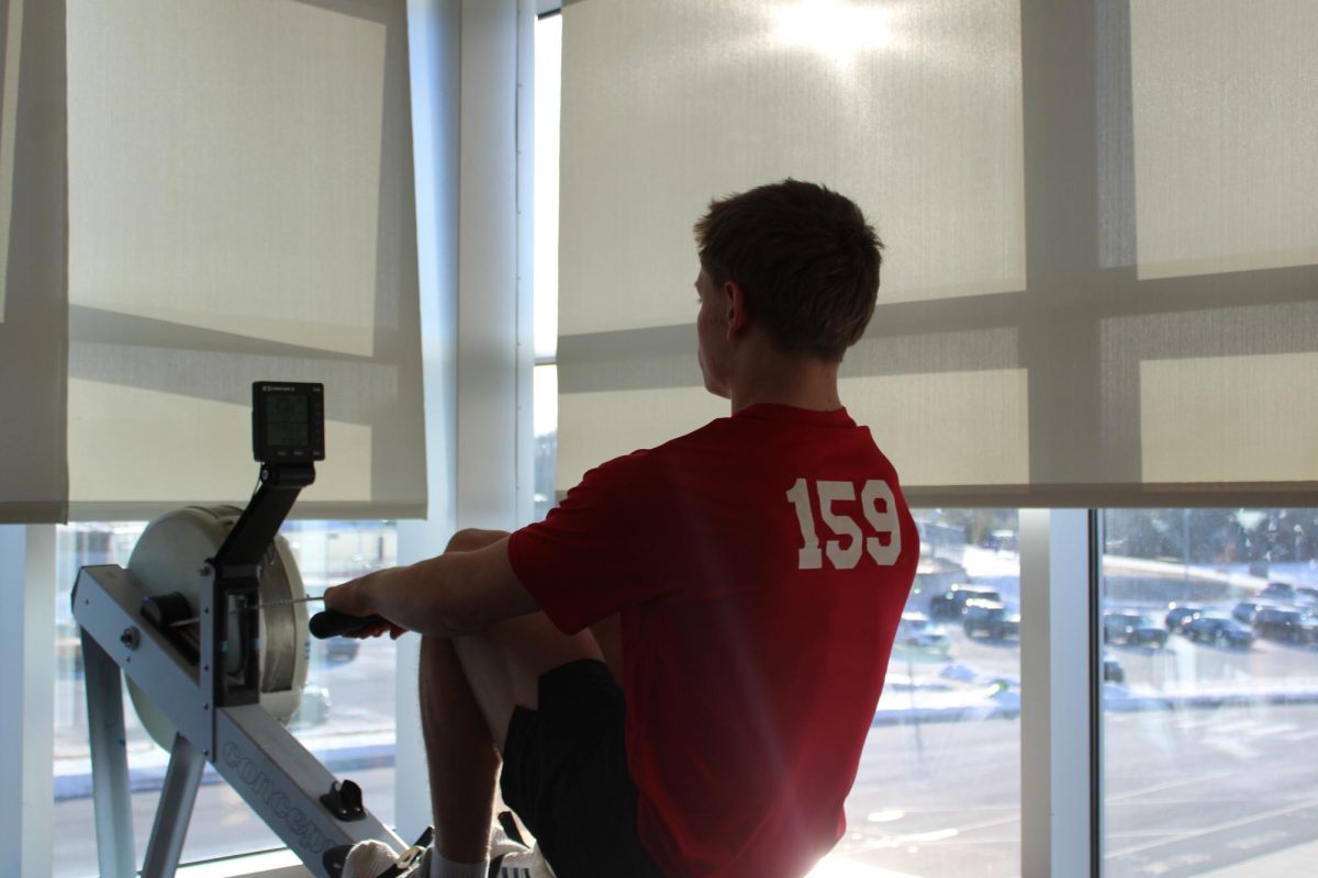 Participant Shane Markowski competes in the rowing section of the Dri-Tri.