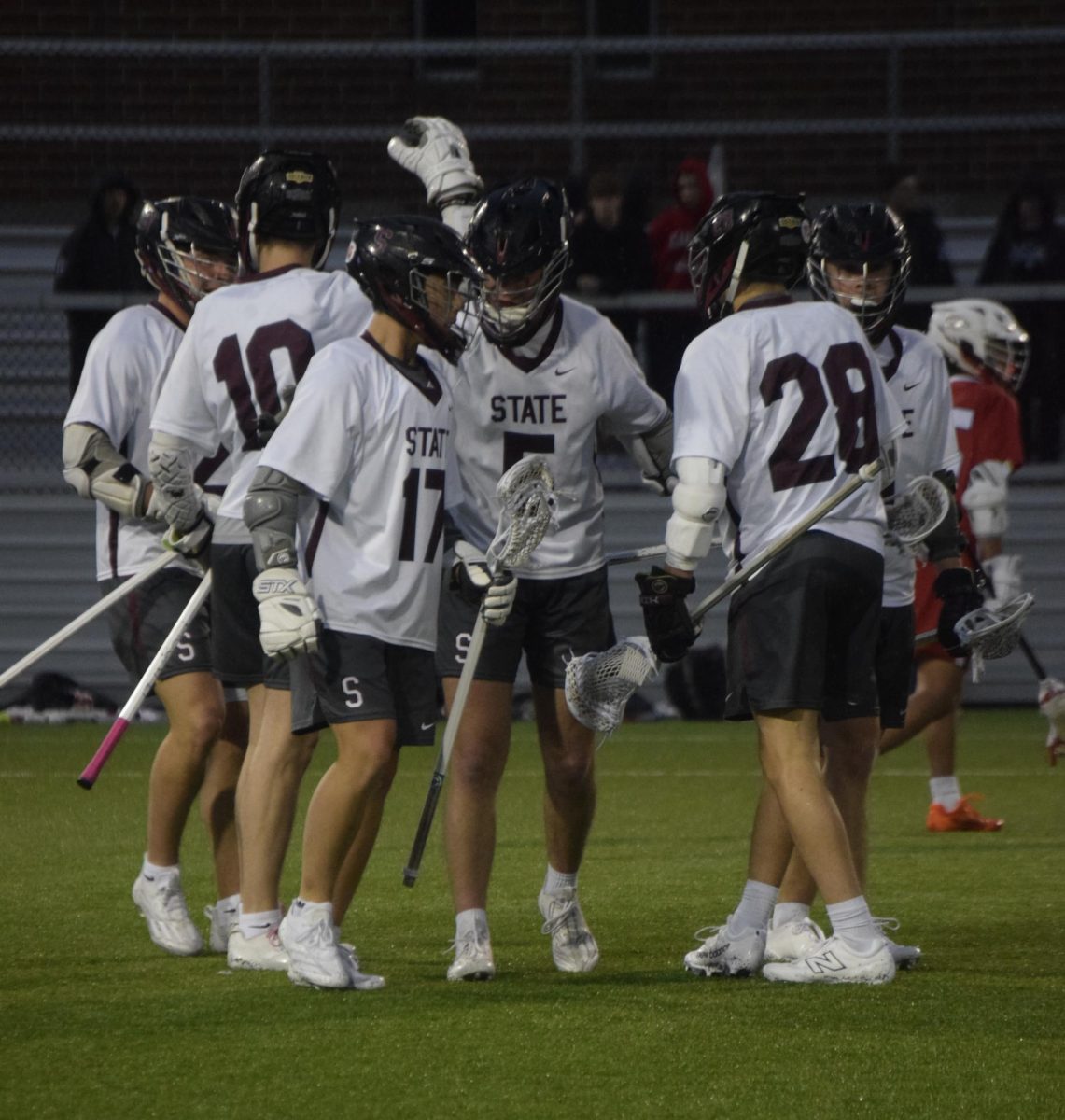 Players celebrating after a goal.