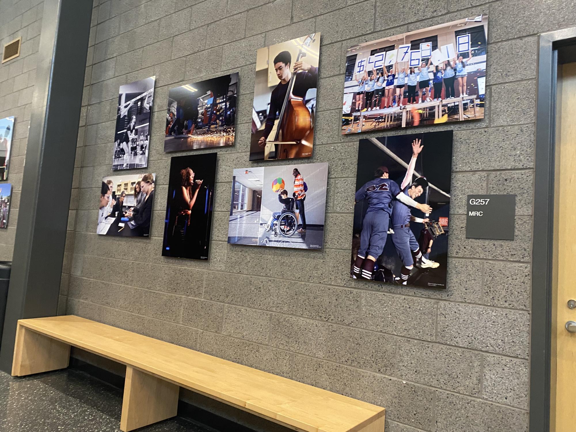 The "Wall of Fame" displays student-taken photos depicting a variety of extracurriculars.