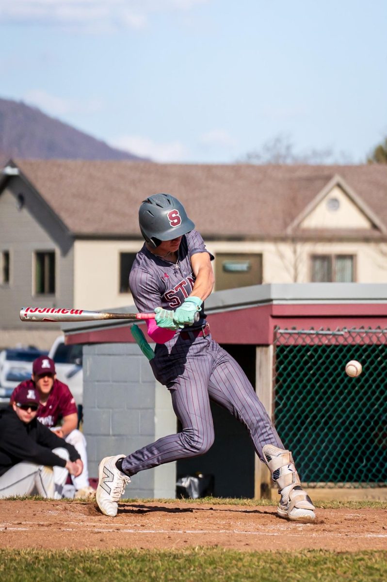 Junior Jake Hall taking a swing at a pitch from an Altoona pitcher in home opener. Photo courtesy of Davontae Hardison. 