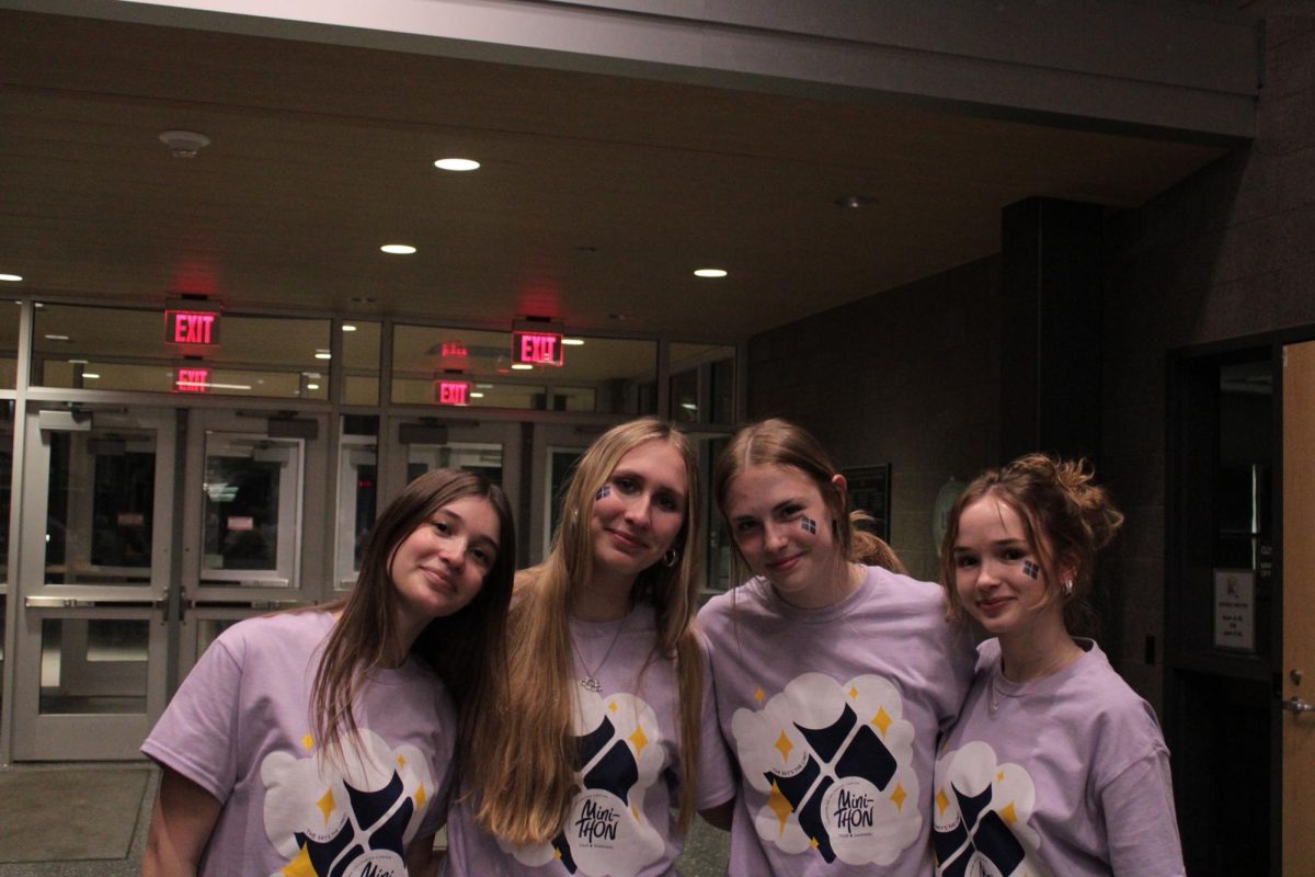Four Friends (Left) Hadley Eicher, Addison Behe, Becca Devoir and Chloe Moeller (Right)  all freshman. They all joined the club with their friend who experienced childhood cancer, "She joined the club with us, so that was kinda part of it" Behe stated. 
