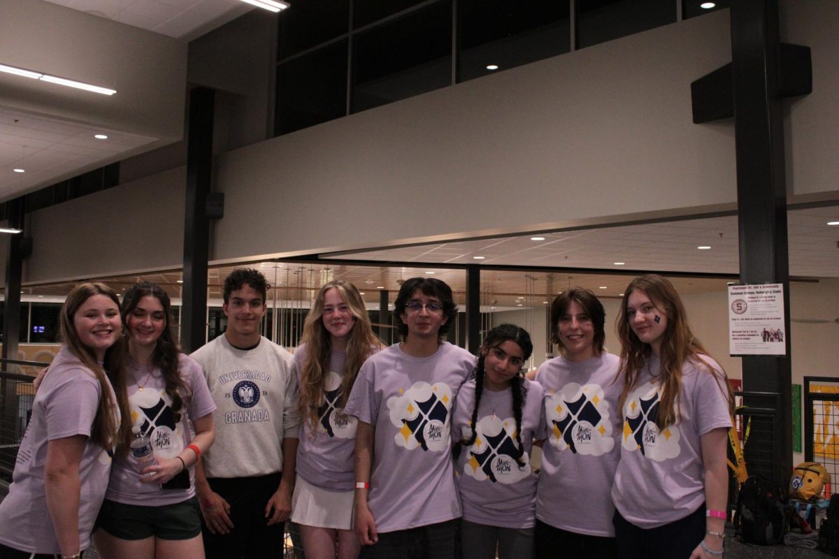 (Left) Maggie Lutz 11th Grade, Eve Kennedy 11th Grade, Augustus Nicholas 12th Grade , Liliana Fuller 11th Grade, Abdullah Rana 11th Grade, Dalia Eldawoody 11th Grade , Gianna Cestone 11th Grade, Melissa Lykens 11th Grade (Right) Standing together for a picture to acknowledge their support. 
