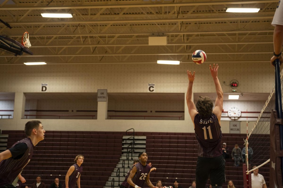 Junior Derrick Campbell sets to State High’s offense.