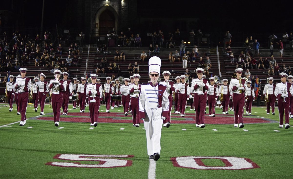 A pillar of State High athletics, the marching band, performs at halftime of the football team's win over Gateway on Aug. 22.