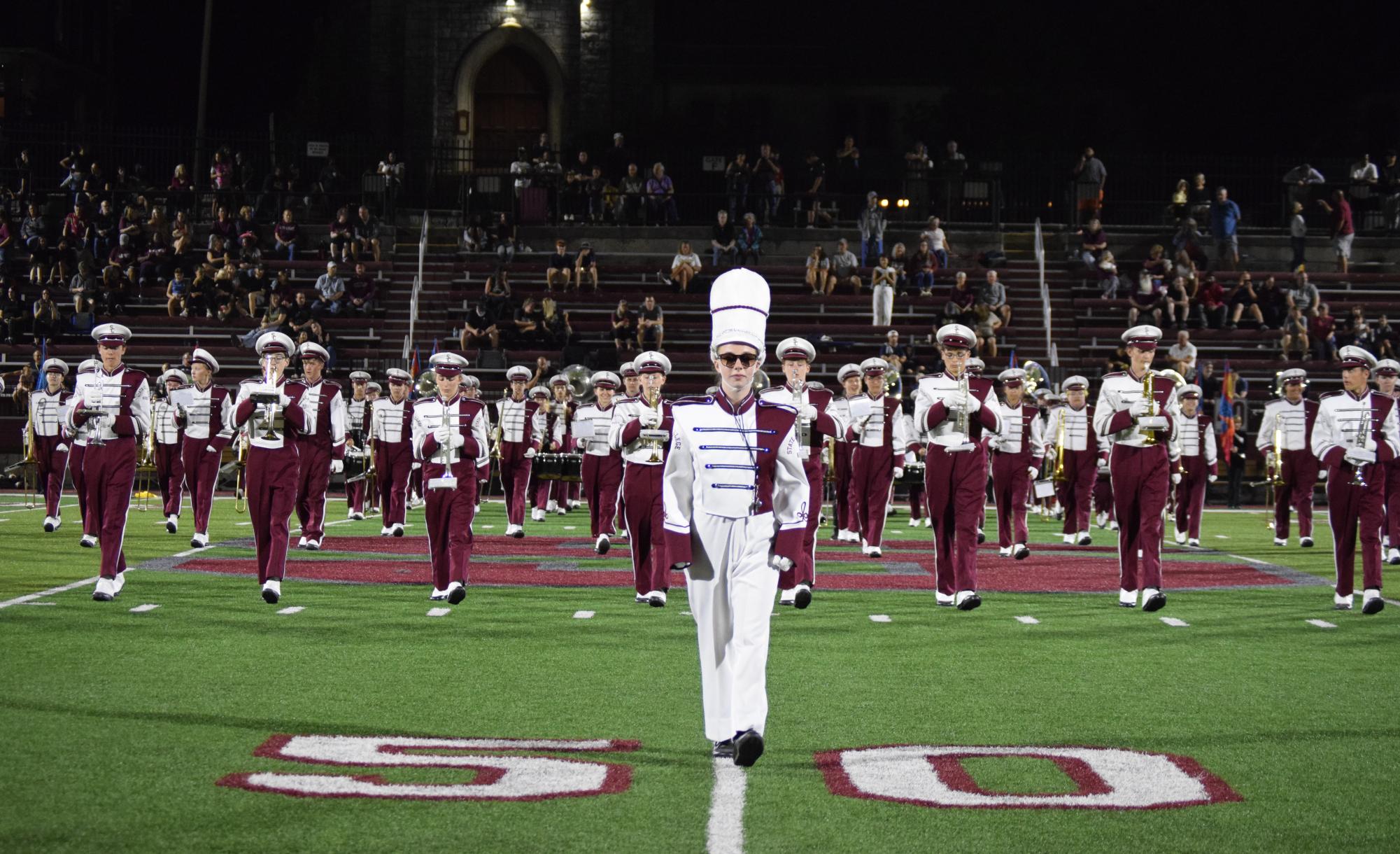 A pillar of State High athletics, the marching band, performs at halftime of the football team's win over Gateway on Aug. 22.