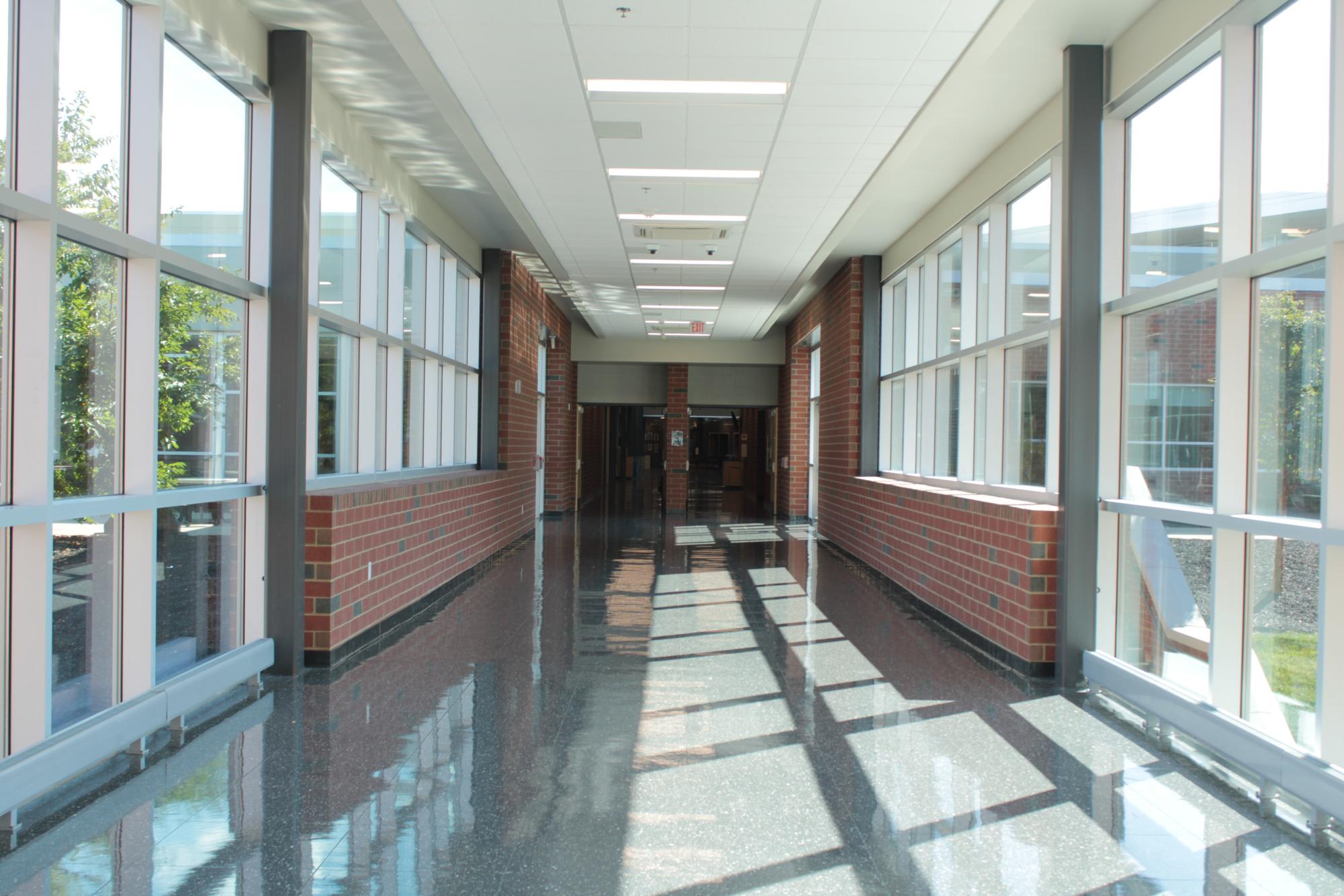 An empty sunlit hallway in State High.