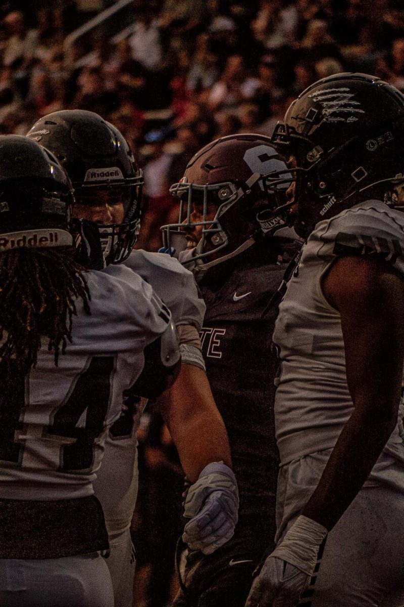Sheffey, surrounded by harrisburg players.