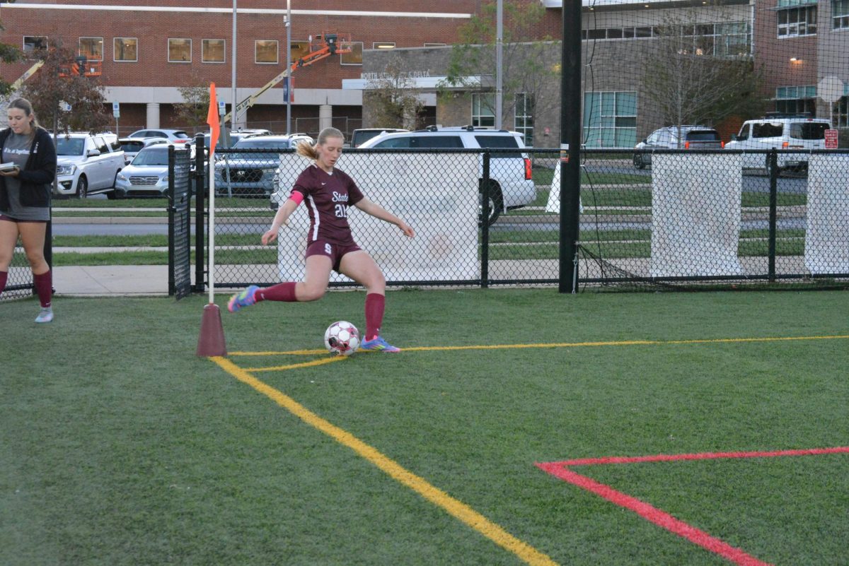 Senior Maya Birkenholtz (midfielder) kicks the ball into the field as she warms up. When asked to sum up her soccer career on the team, Birkenholtz said, “We haven't had a lot of consistency with coaching, but I've had such an amazingly good experience with the team…Just the girls been amazing and it's awesome…A really great experience, even though it's hard with actually scoring and stuff like that. It's really fun.”