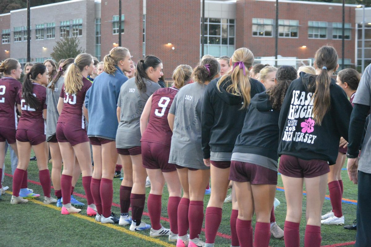 The team lines up in a tunnel and gives the varsity players high-fives as they run onto the field before the start of the game. Five out of the six seniors are on varsity, and when asked on how the seniors impacted her, sophomore Éa Stilson said, “Especially because this is my second year, and I knew them as juniors last year, they've really made it so that I feel like I have a place on the team, and they do a good job keeping everyone engaged and doing what they're supposed to be, while also having fun.” 