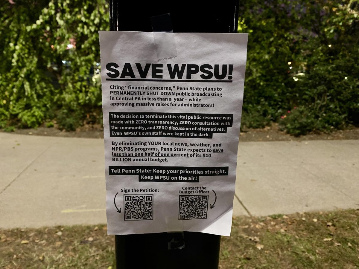 A sign on a light pole near Beaver Stadium asks the public to support WPSU.