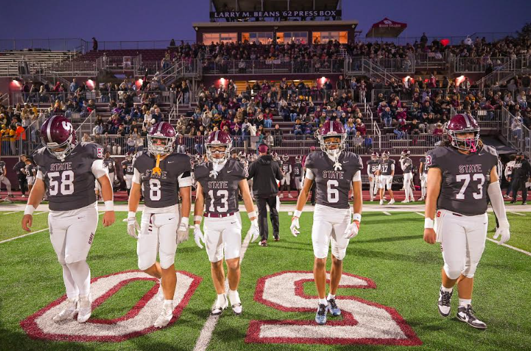 The State High captains, junior Matt Gaul, and seniors Jake Lukac, Hank Lustig, Daimear Coad, and Luke Milito take the field.