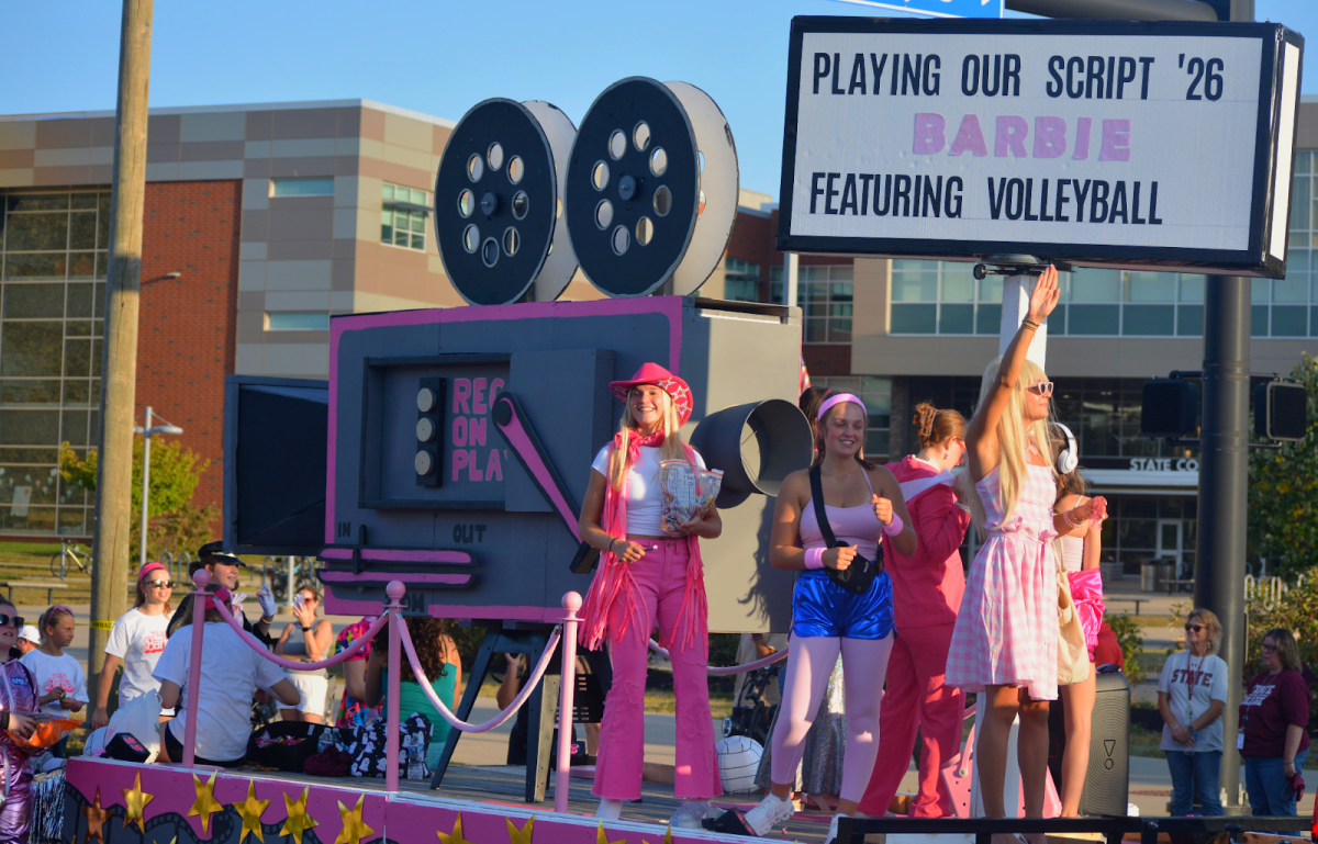 Seniors Harper Campbell, Helena Woskob, and Camryn MacNeely dance on the girls' volleyball team’s Barbie-themed float. Team spirit was sky-high coming into the parade, as they started their season off with nine straight wins. Junior Hannah Woskob spoke about the dedication the team put into the float. “Everybody worked really hard to do good on it…All the seniors made sure everybody showed up and did what they needed to do, and we deserved to win.”