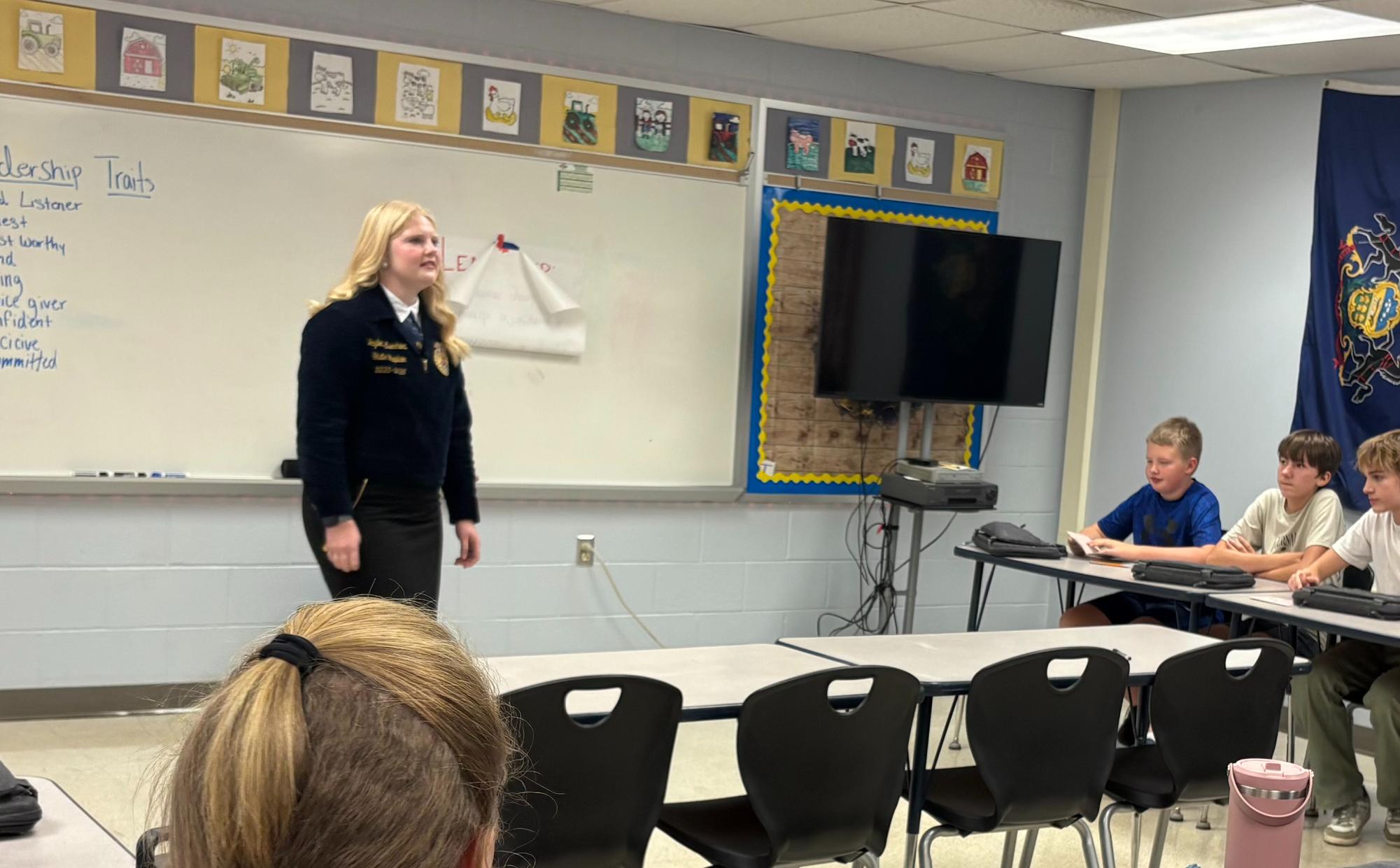 State High alumna Jaylene Everhart stands in front of a class while leading an FFA workshop. Photo courtesy of Jaylene Everhart