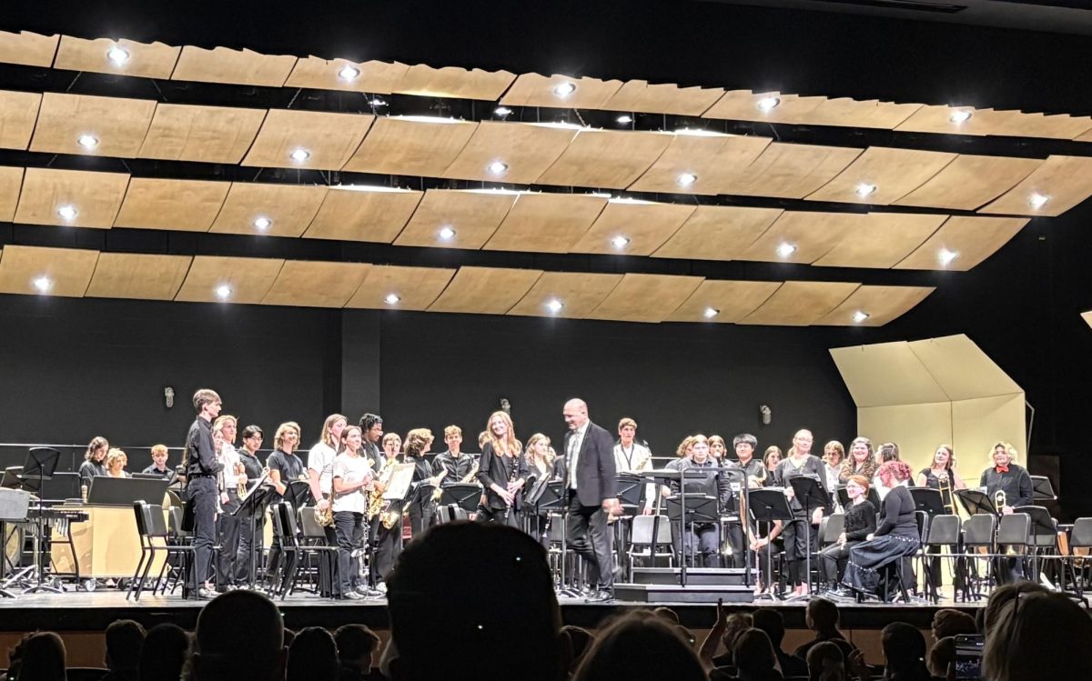 Concert Band performs an encore with Paul Lescowicz directing.
