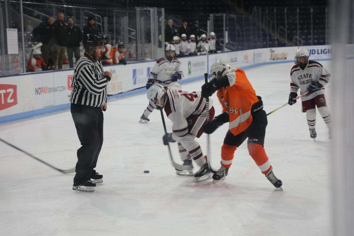 Rylen Coffey fights for the puck after a tip off. 