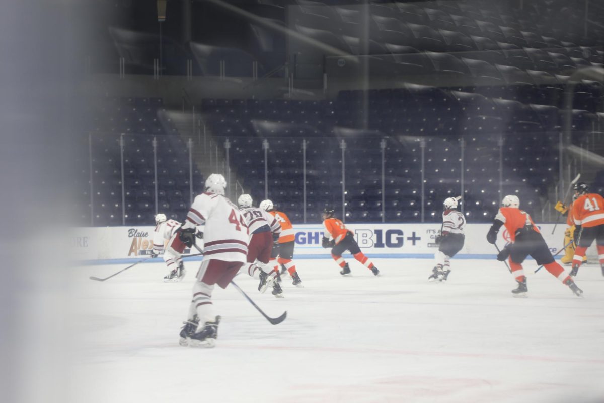 Rylen Coffey and the team work together defending the goal. “I love our camaraderie in our team and the level of intensity when playing hockey.” 