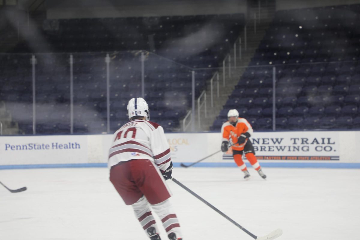Rylen Coffey faces off against the opponent in the Pegula ice rink. 