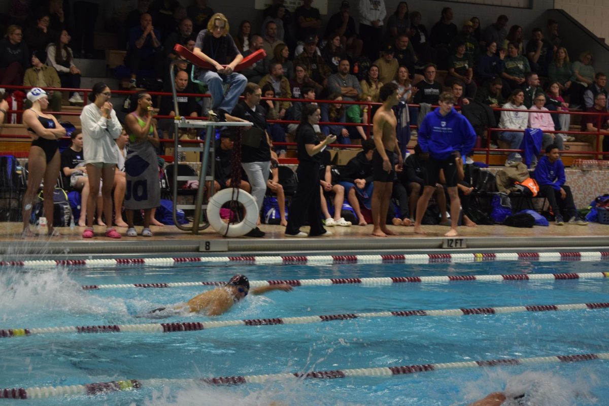 One of races during the swimming home opener Meeting at the North Natatorium.