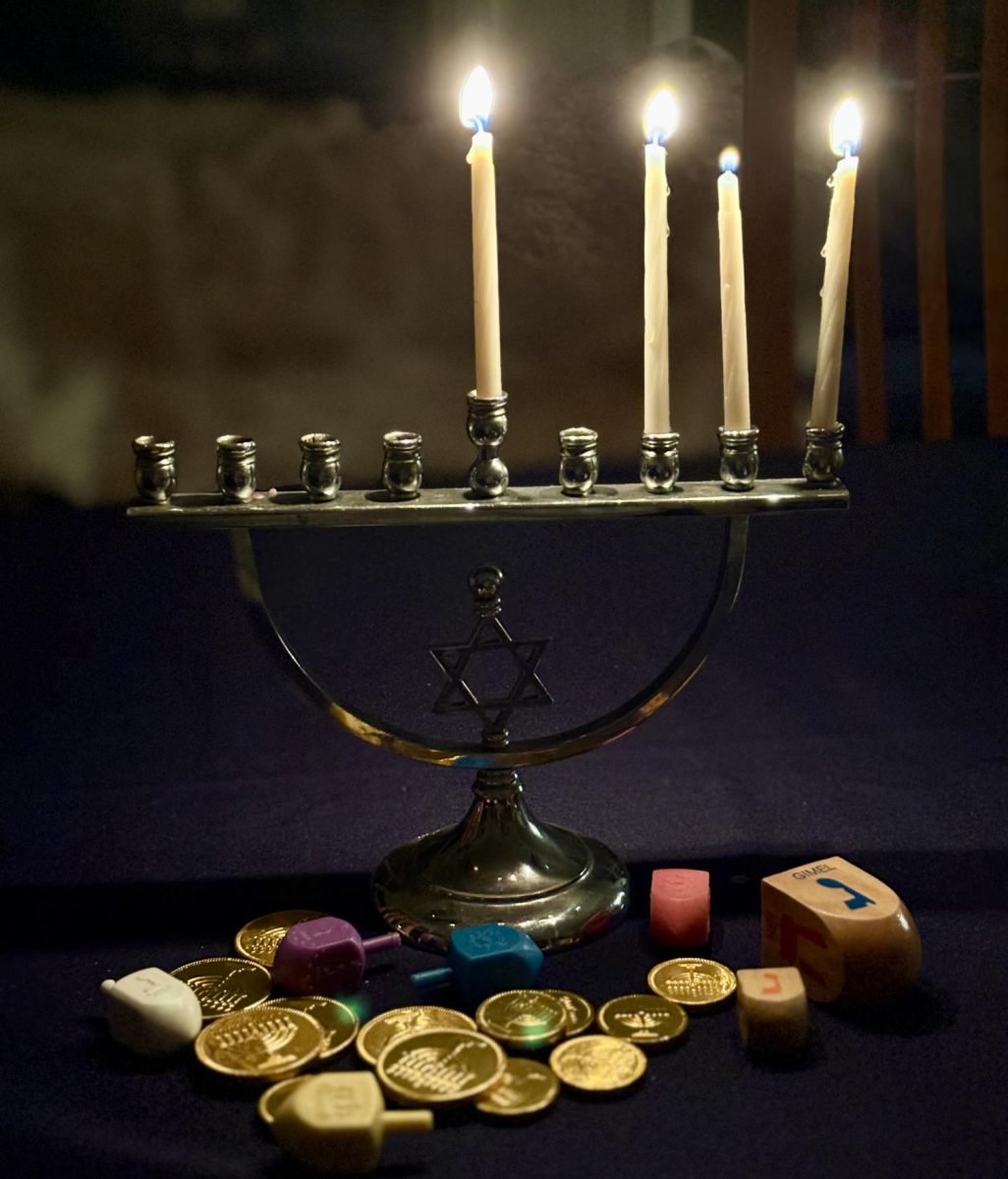 A menorah is lit with four candles for the third day of celebrations for Hanukkah, the Jewish Festival of Lights.