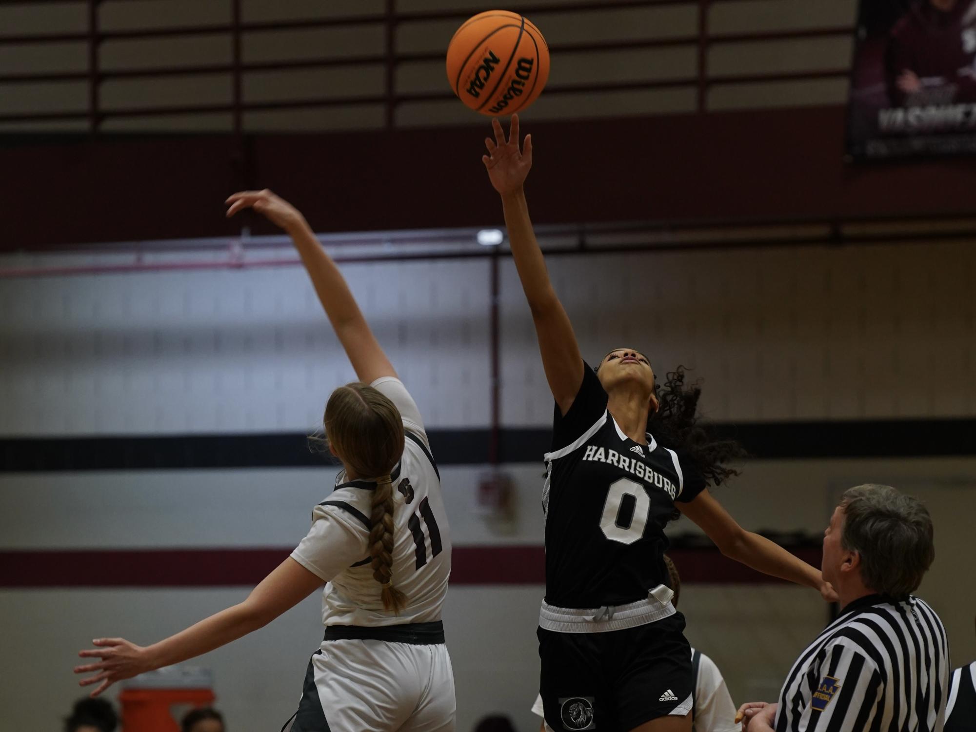 Sophomore Ally Swauger gets the ball at tip-off. 