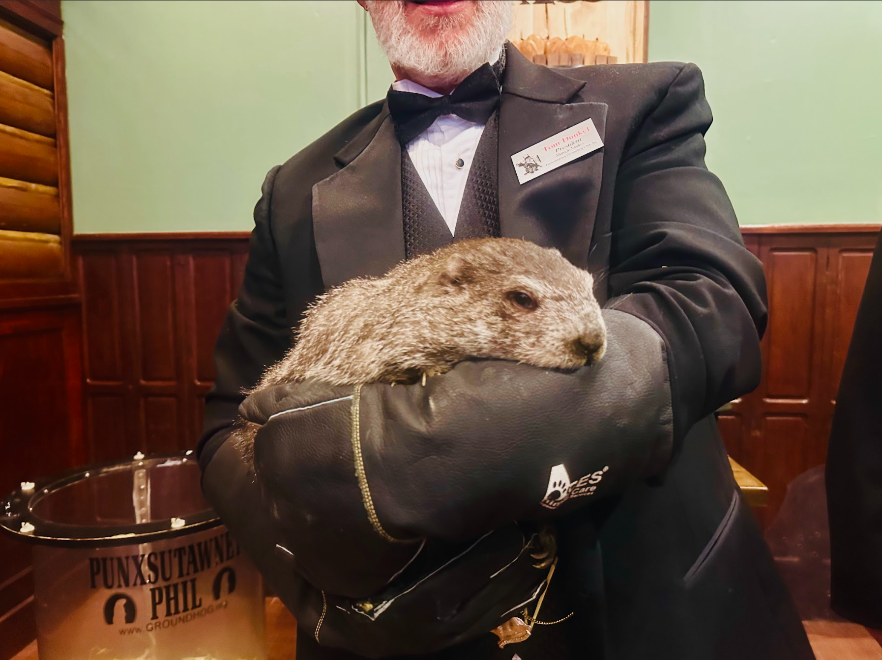 Groundhog Club President Tom Dunkel holds Punxsutawney Phil during the meet and greet. 