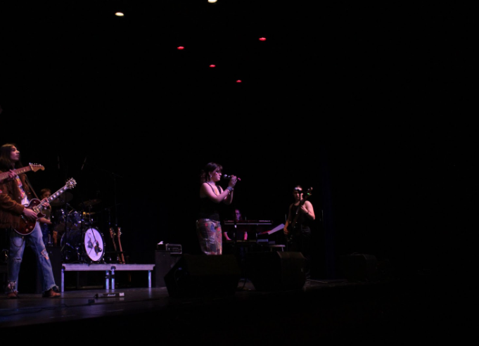 Vocalist Audrey Kelso performing an arranged duet with guitarist James Lukehart.