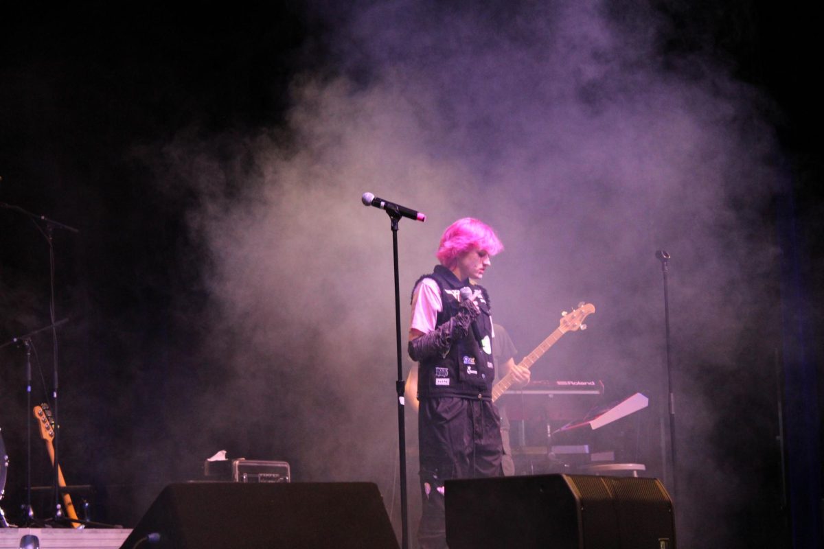 Rock ensemble singer R. Sylvie performs War Pigs by Black Sabbath as the concert’s evening opener. “My favorite part of the concert had to be being a part of it,” Sylvie mentioned. “Everything starts out rough, but it gets really good at the end and all the [effort] pays off.”
