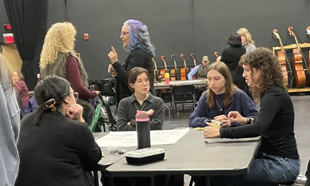 Students converse with SCASD school board members during the work session. 

