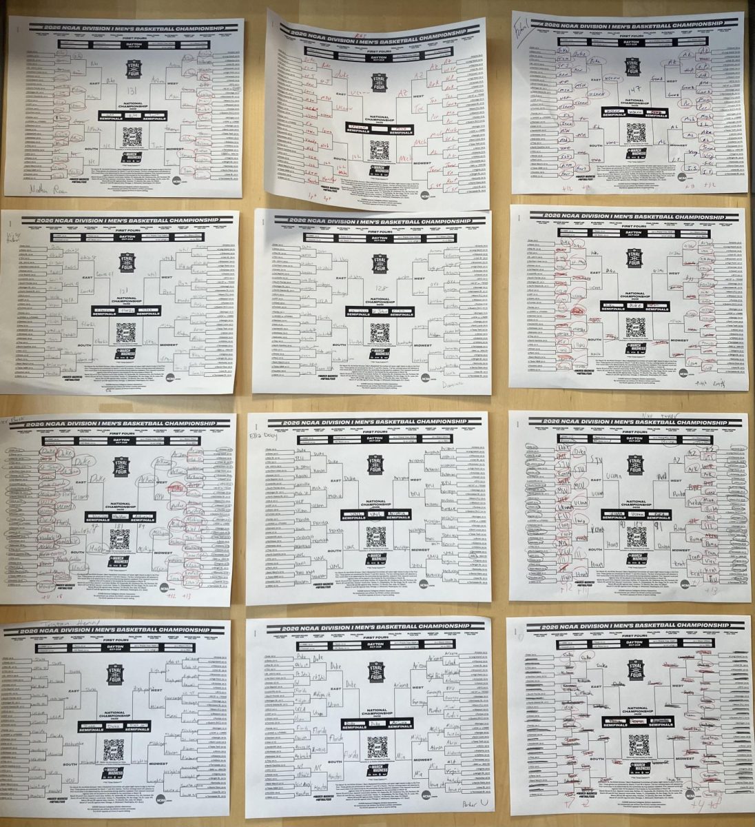 A wide array of brackets is hung up on a door.