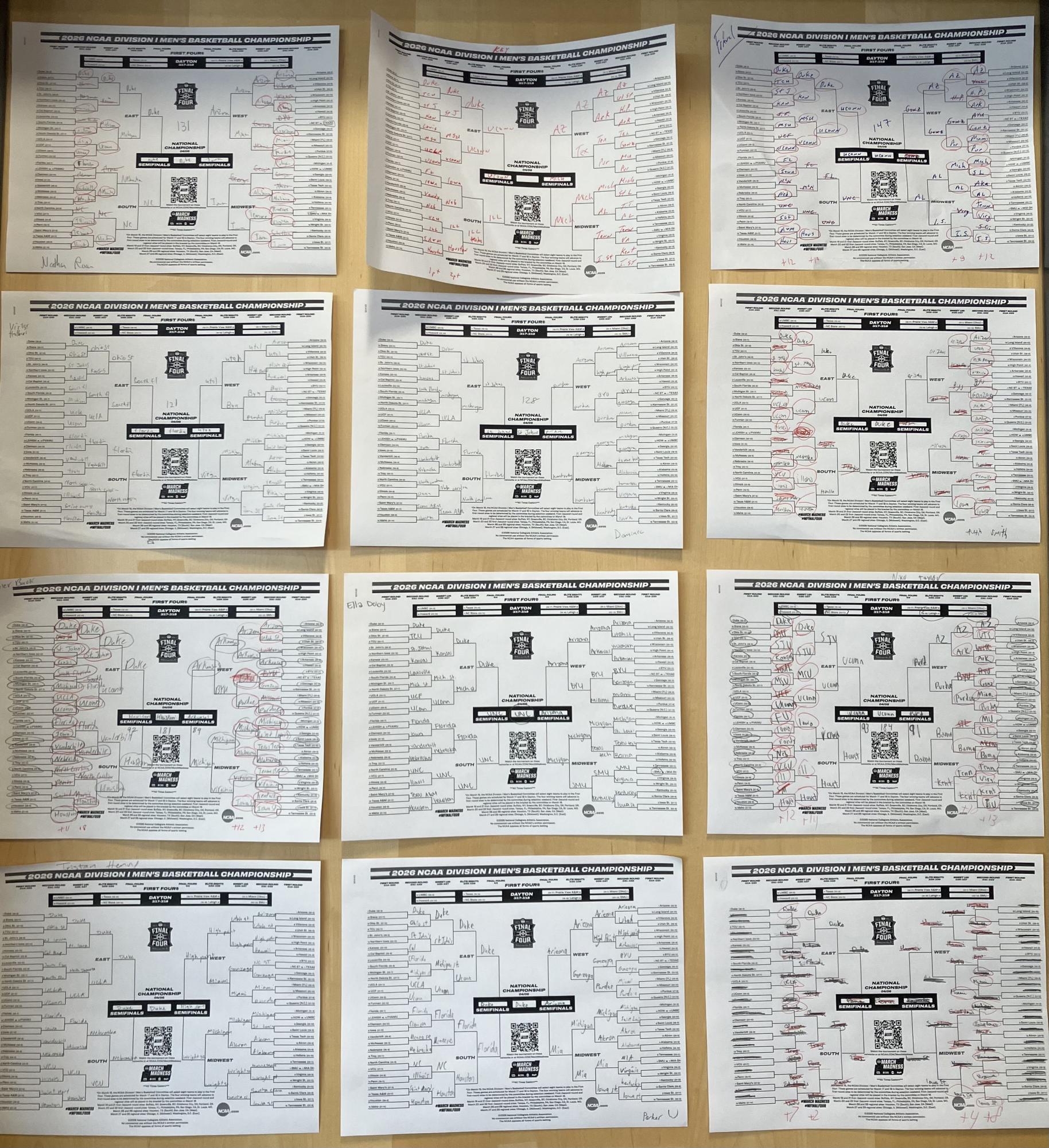 A wide array of brackets is hung up on a door.