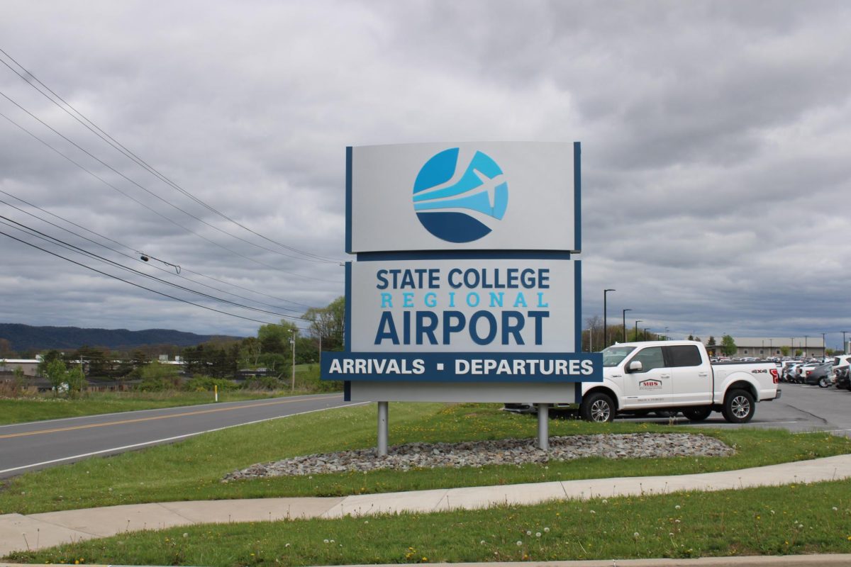 The State College Regional Airport sign stands in front of the main building.