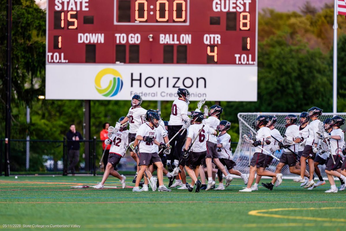 State High rushes the field in celebration of their seven-point win over Cumberland Valley. 