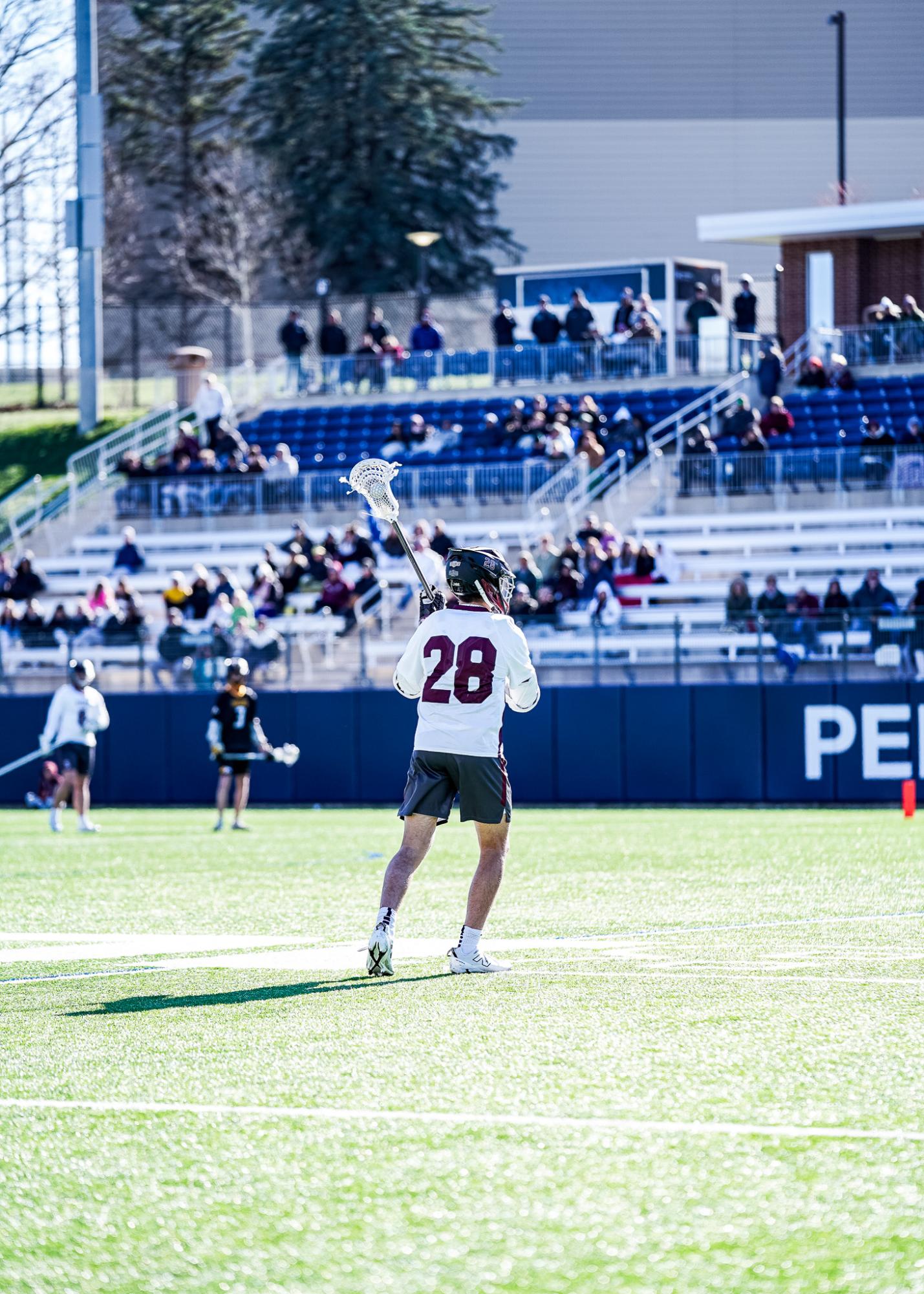 Junior Trey Combs looks for an opening to advance the ball forward at Panzer Stadium.